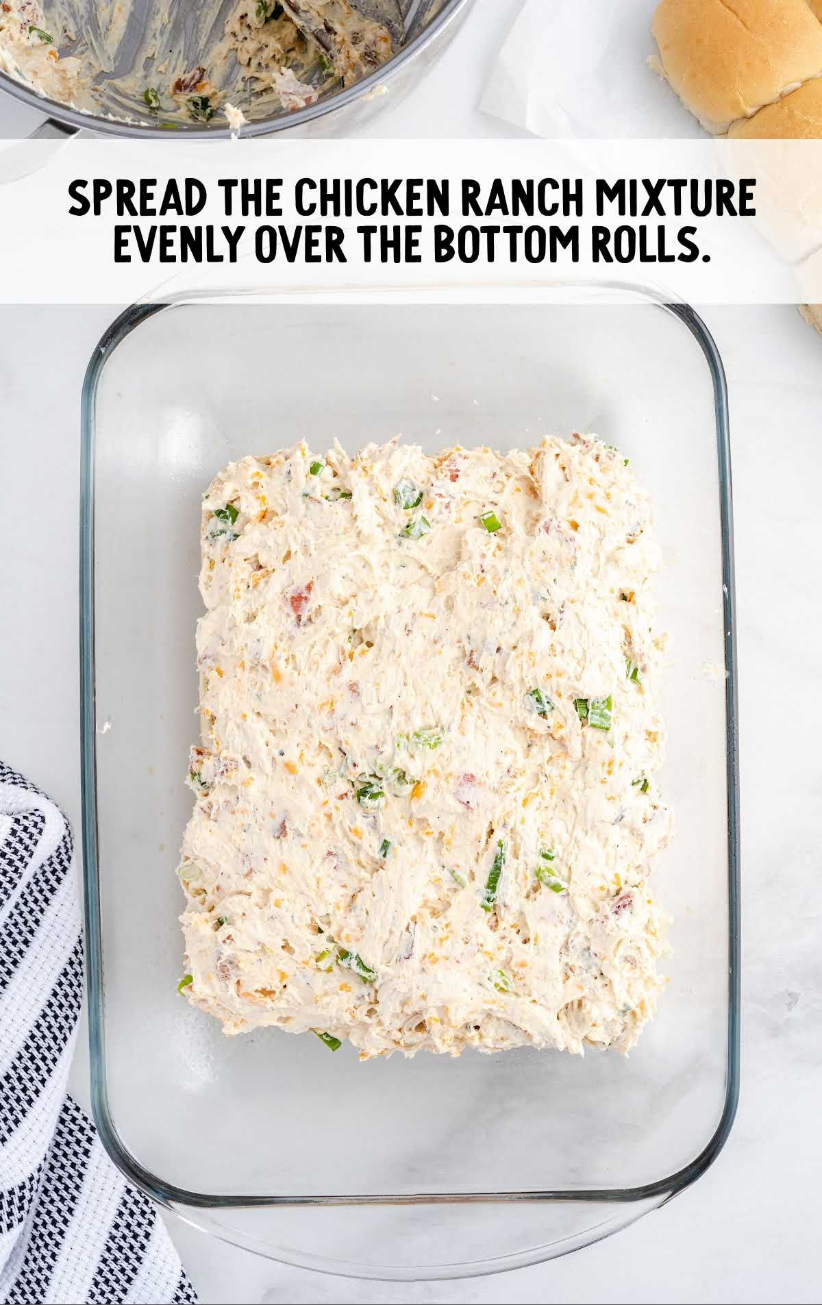 chicken ranch mixture spread over the rolls in a baking dish