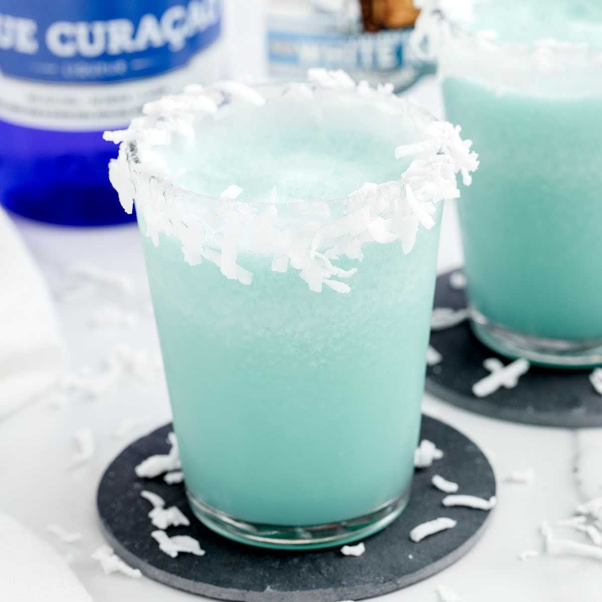 glasses of Cocktails topped with shredded coconut
