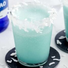 glasses of Cocktails topped with shredded coconut
