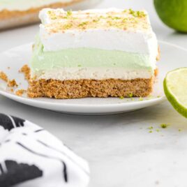 close up shot of a slice Key Lime Pie Lasagna on a plate