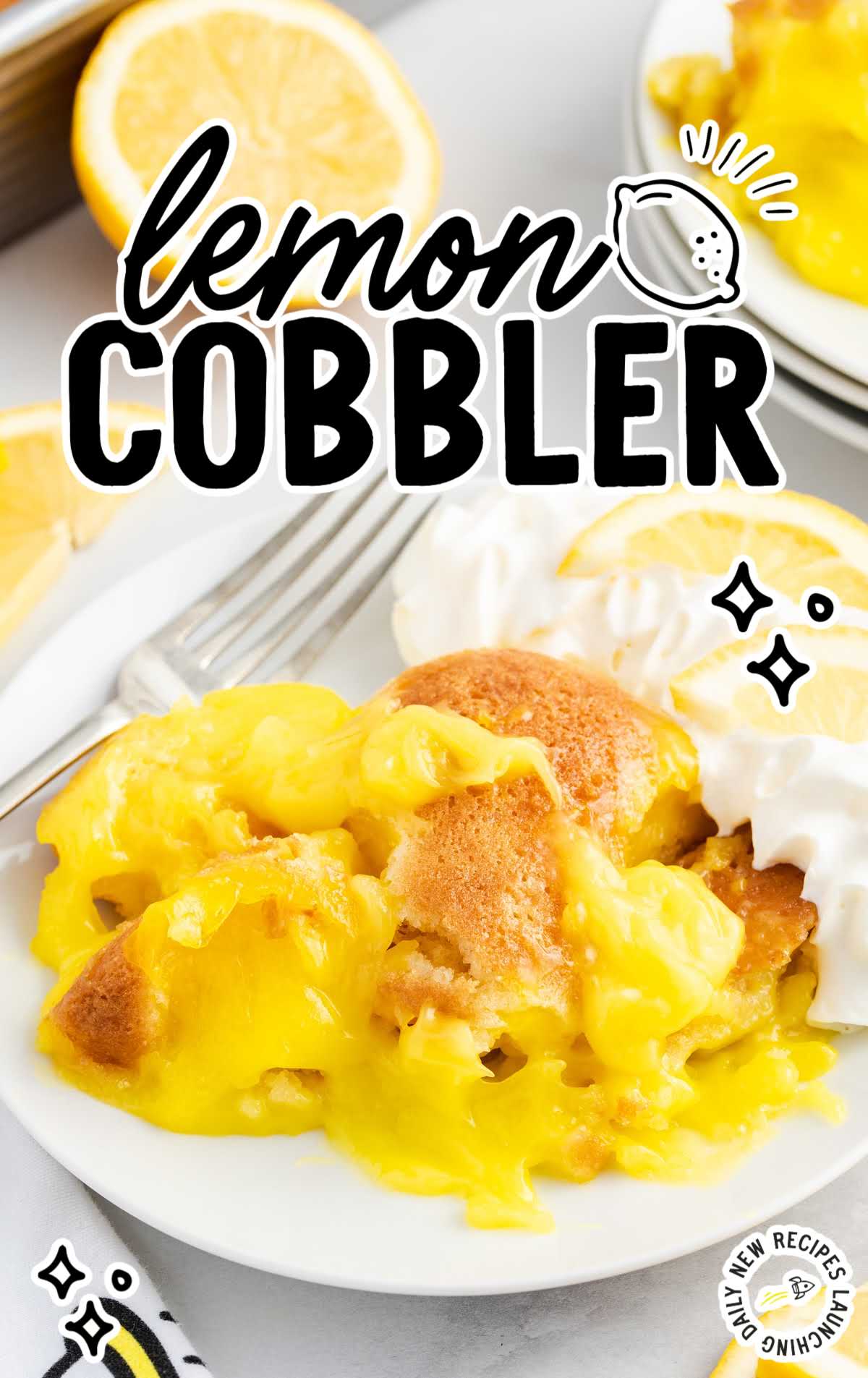 a piece of Lemon Cobbler on a plate with ice cream and a fork