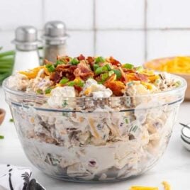 close up shot of Loaded Baked Potato Salad in a bowl