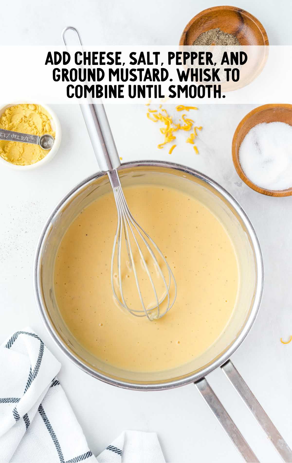 cheese, salt, pepper, and ground mustard whisked together in a pot