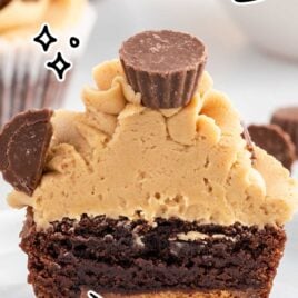 close up shot of Reese's Peanut Butter Cupcake with a bite taken out of it on a plate