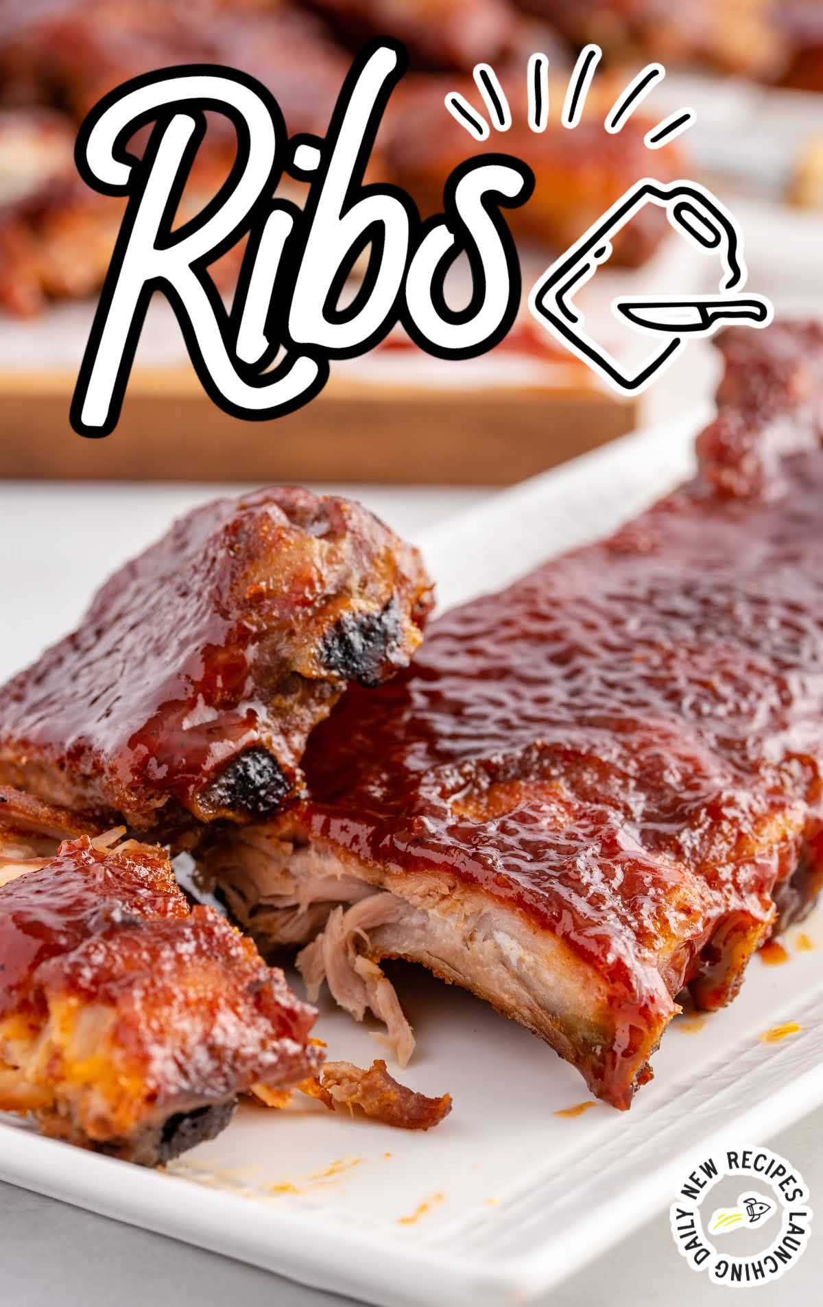 close up shot of a bunch of Ribs on a plate