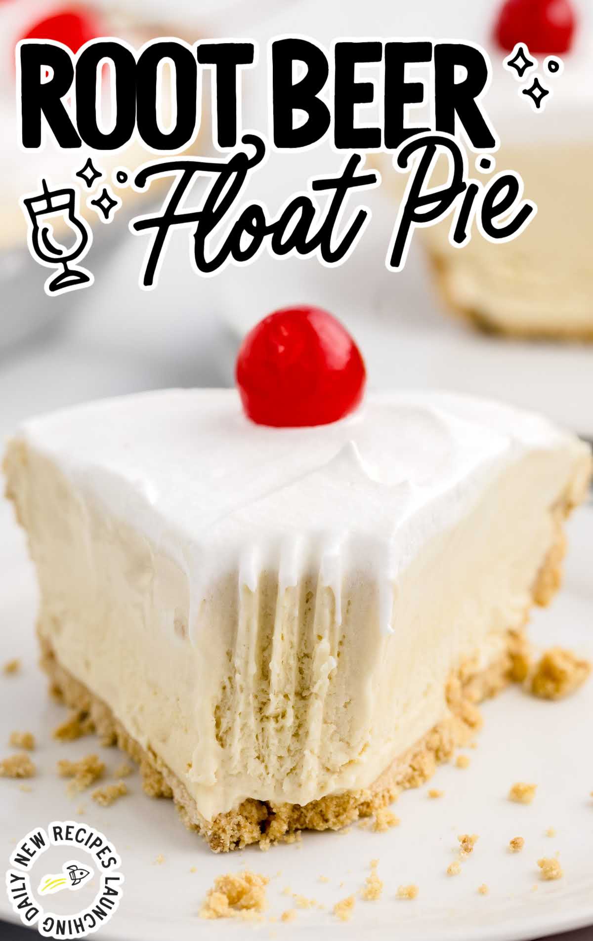 close up shot of a slice of Root Beer Float Pie topped with a cherry on a plate with a bite taken out of it