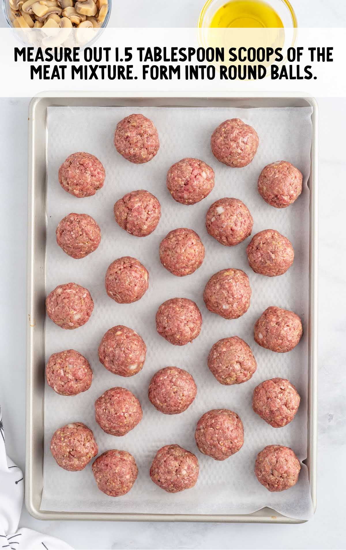 meat mixture form into balls in a baking pan