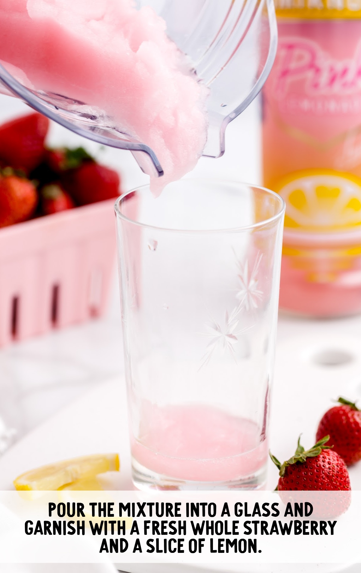 Strawberry Lemonade Cocktail poured in a glass from a blender