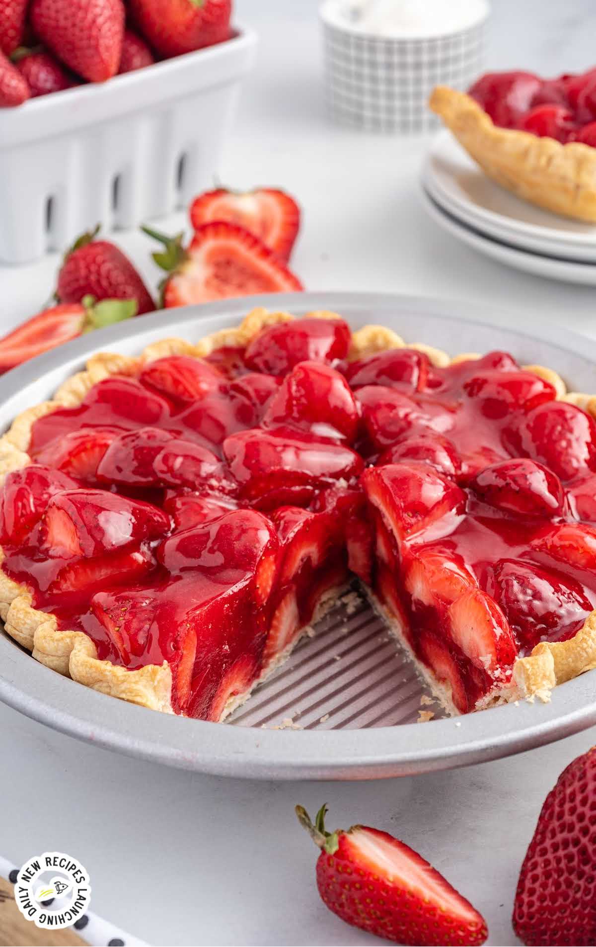 Strawberry Pie in a pie dish with a slice missing