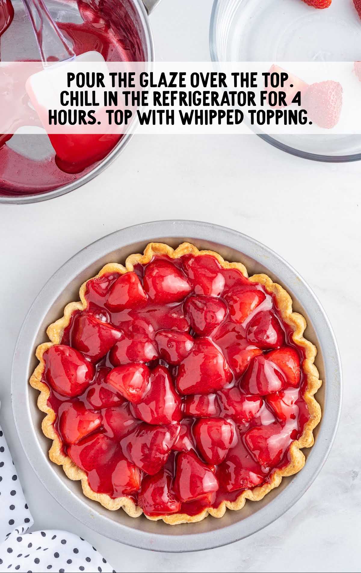 strawberries glaze over the pie in a pie dish