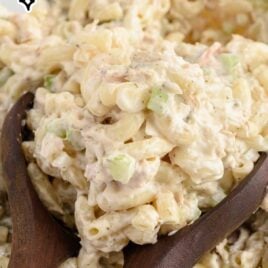 close up shot of Tuna Macaroni Salad in a bowl with tongs