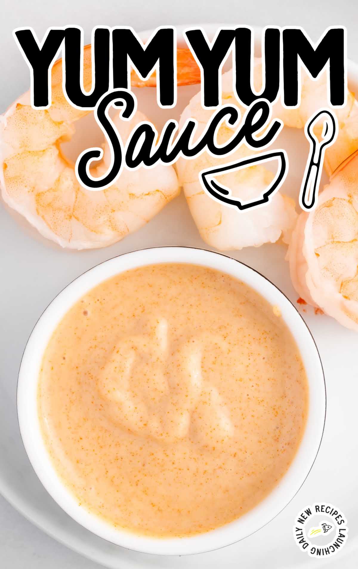 overhead shot of Yum Yum Sauce in a cup with shrimp