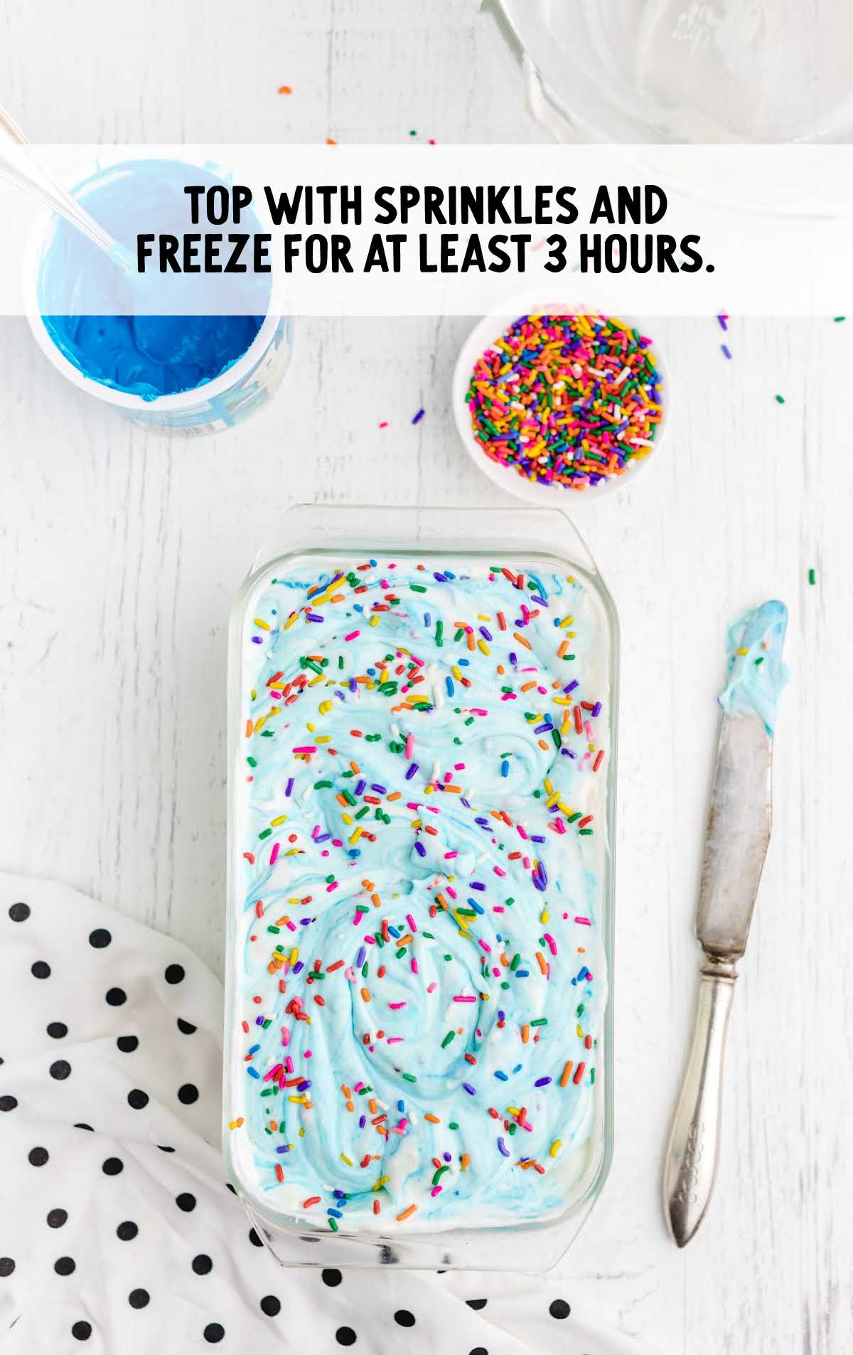 cake topped with sprinkles in a baking dish