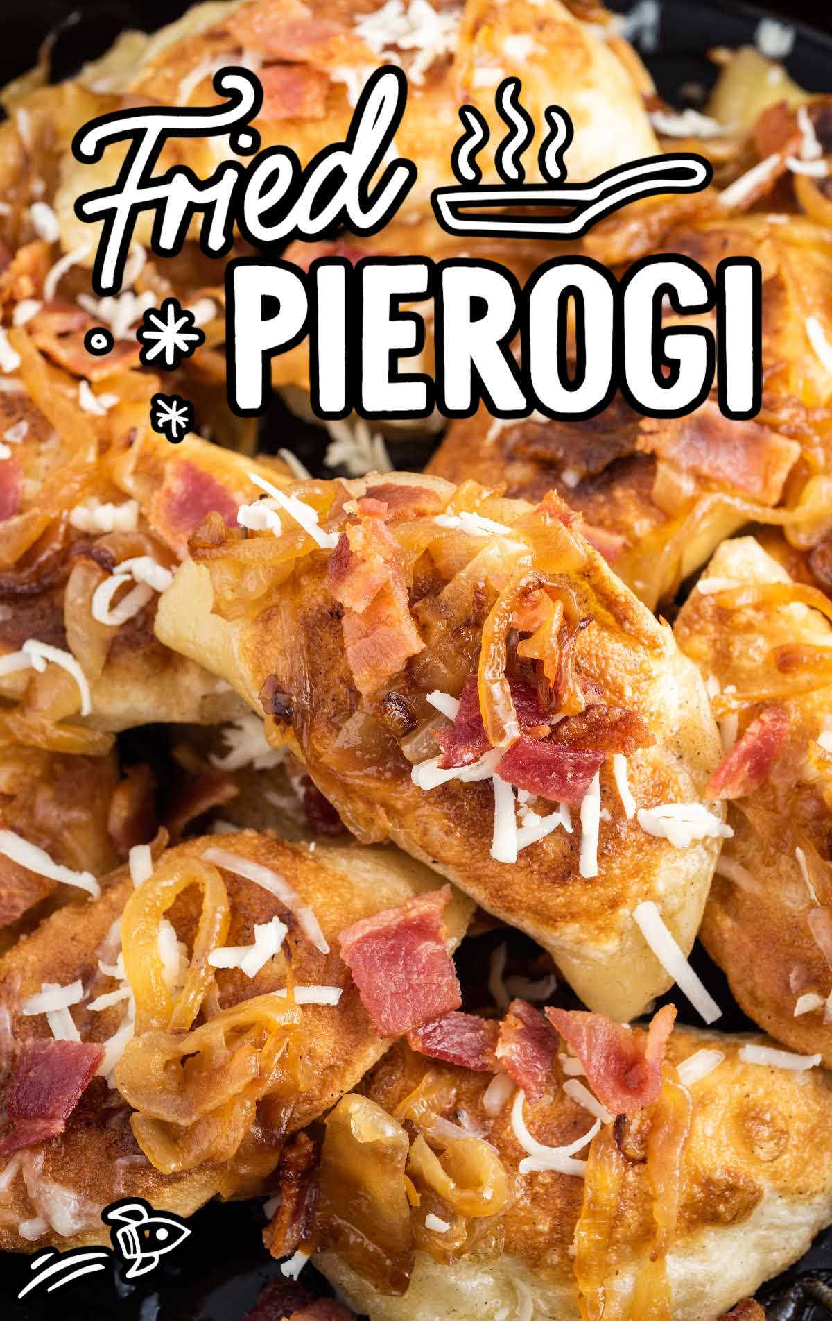 a bunch of Fried Pierogi topped with bacon bits and shredded cheese