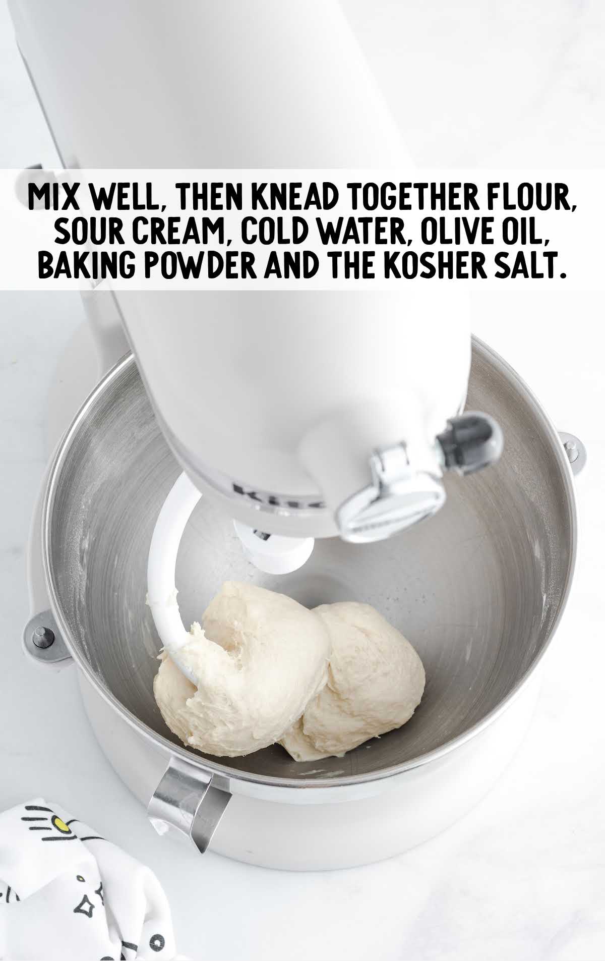 flour, sour cream, water, olive oil, salt and baking powder blended together in a blender