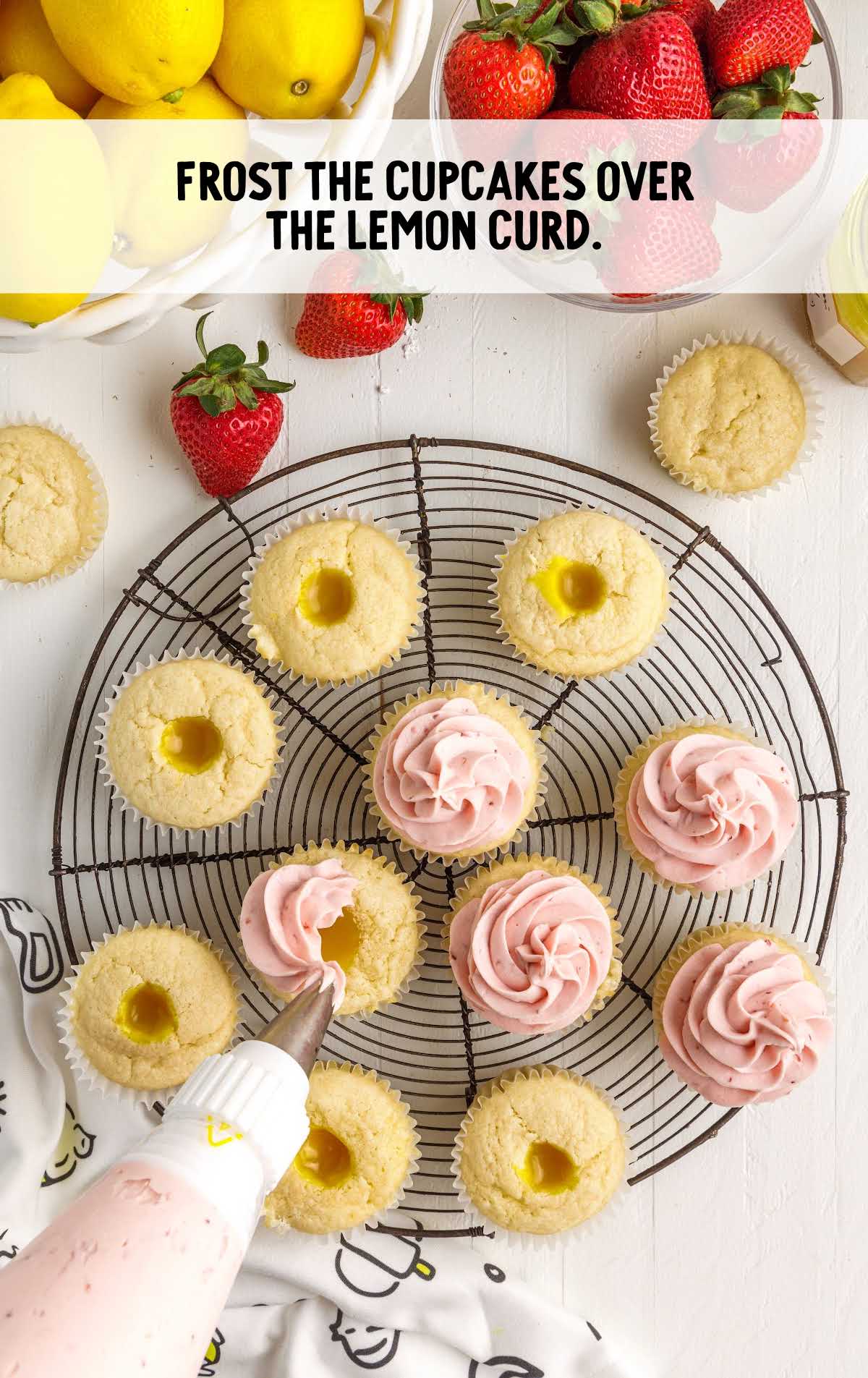 cupcake frosted over the lemon curd on a stand