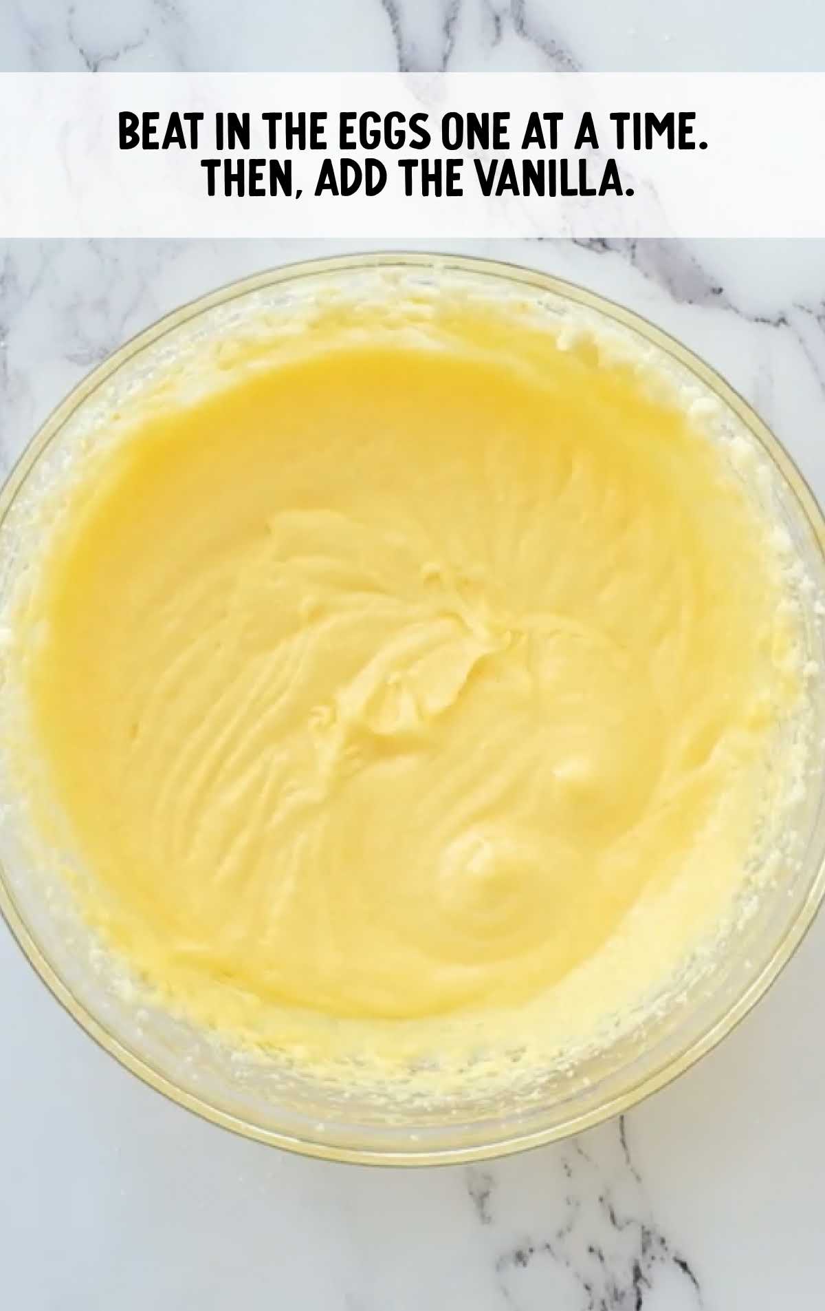 eggs and vanilla mixed together in a bowl