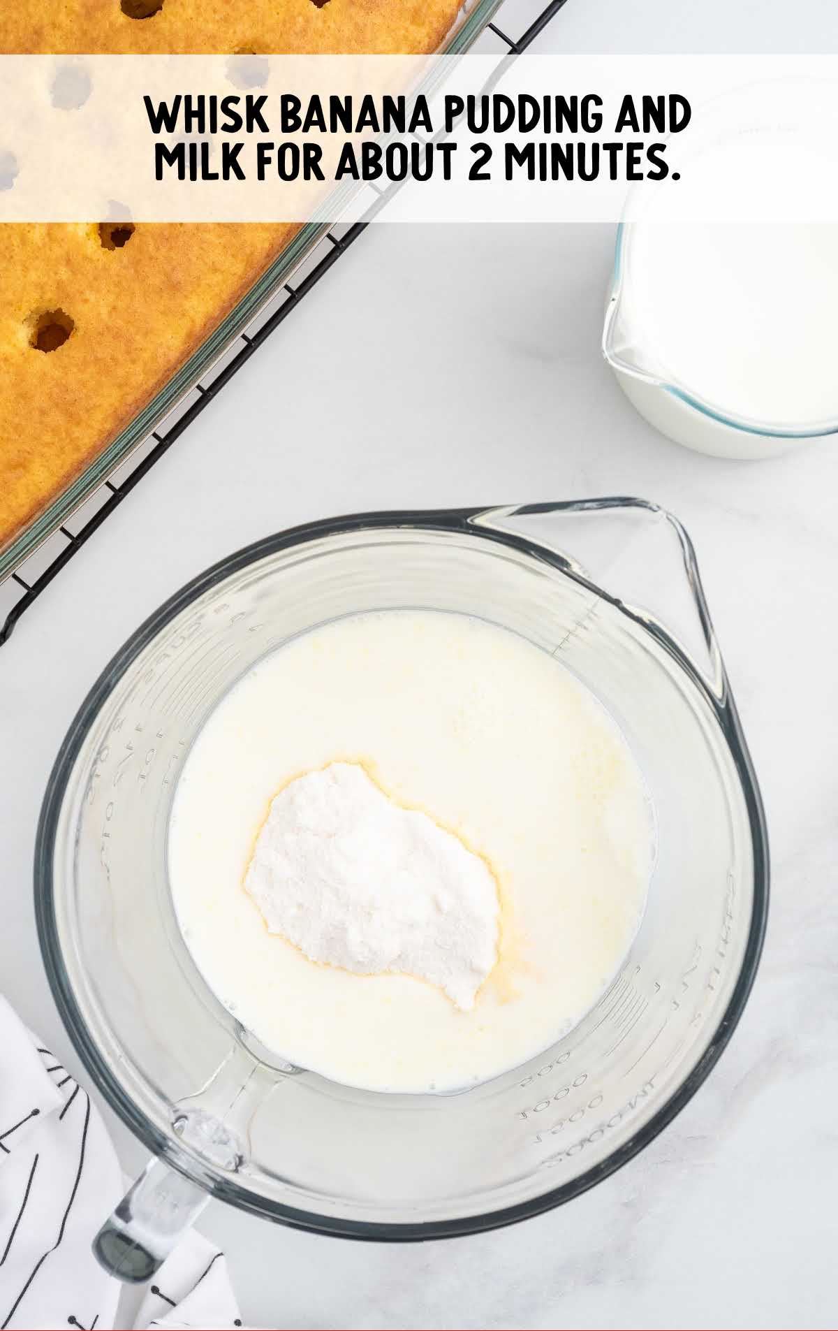 banana pudding and milk whisked together in a cup