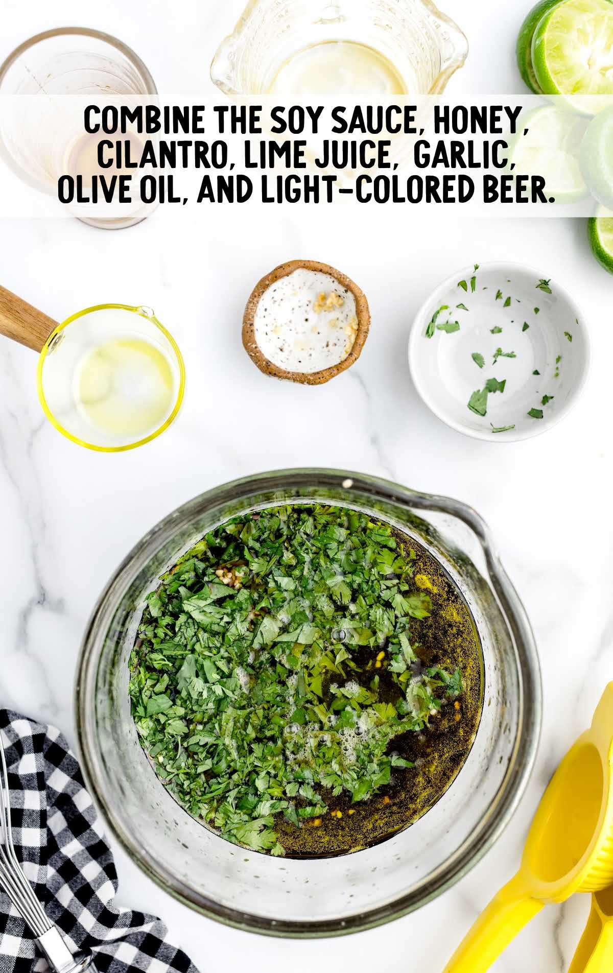 soy sauce, honey, cilantro, lime juice, garlic, olive oil, and light colored beer combined in a bowl
