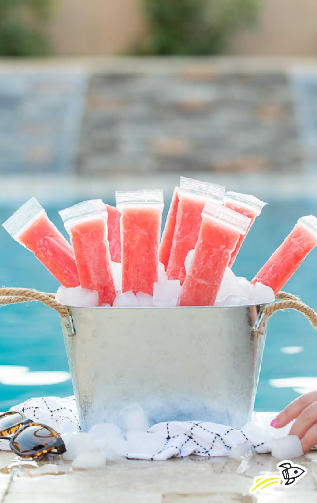 Boozy Popsicles in a bucket of ice