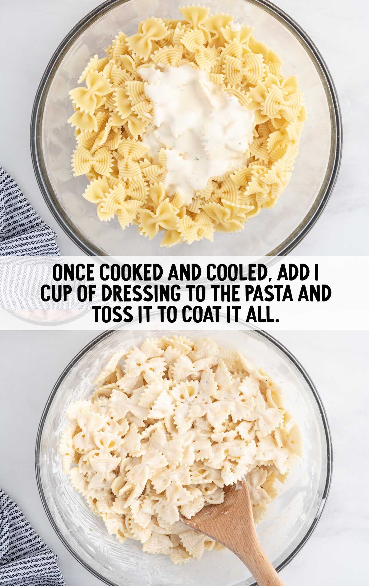dressing tossed with the pasta with a spoon in a bowl
