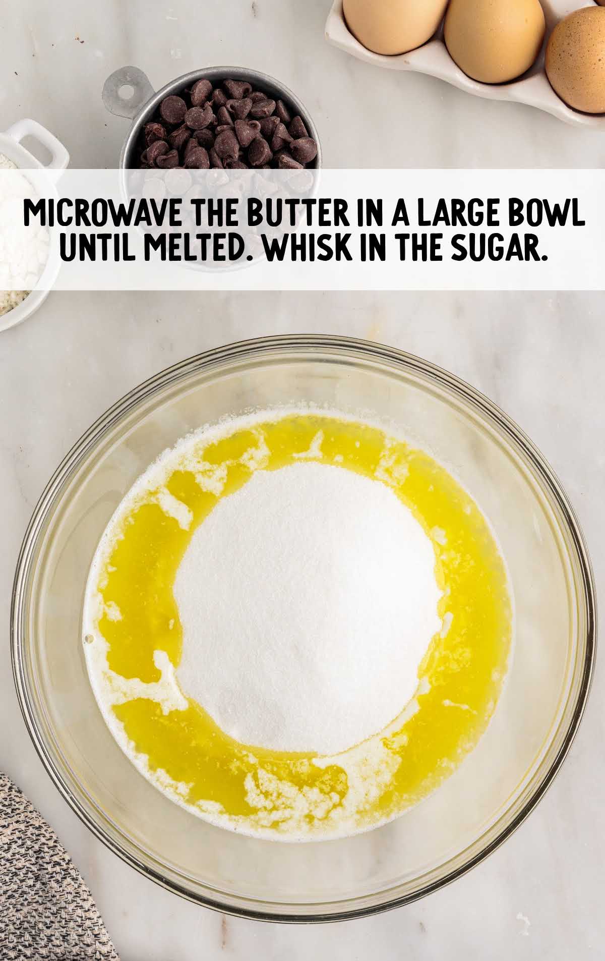 melted butter and sugar whisked together in a bowl