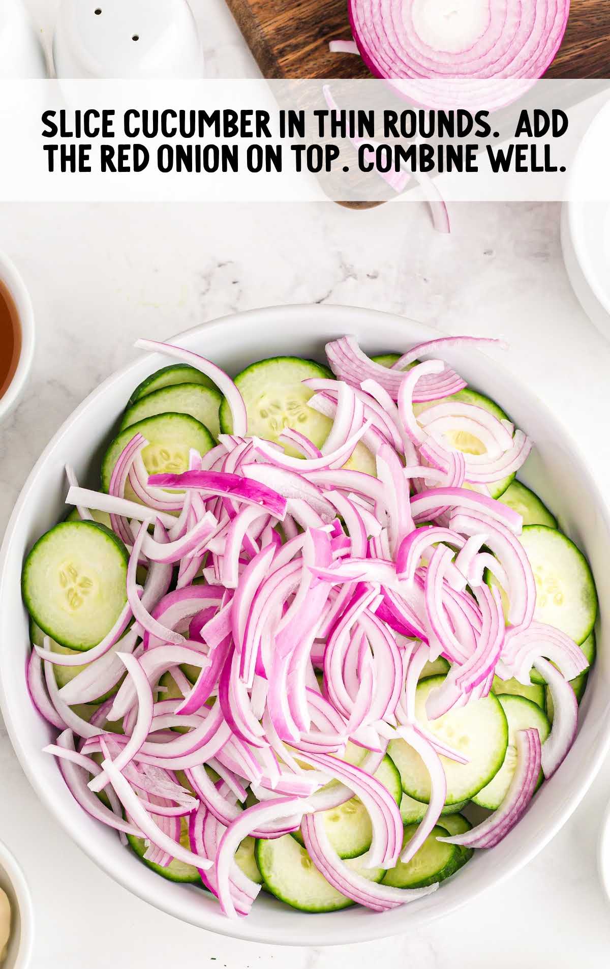cucumber and onion combined in a bowl