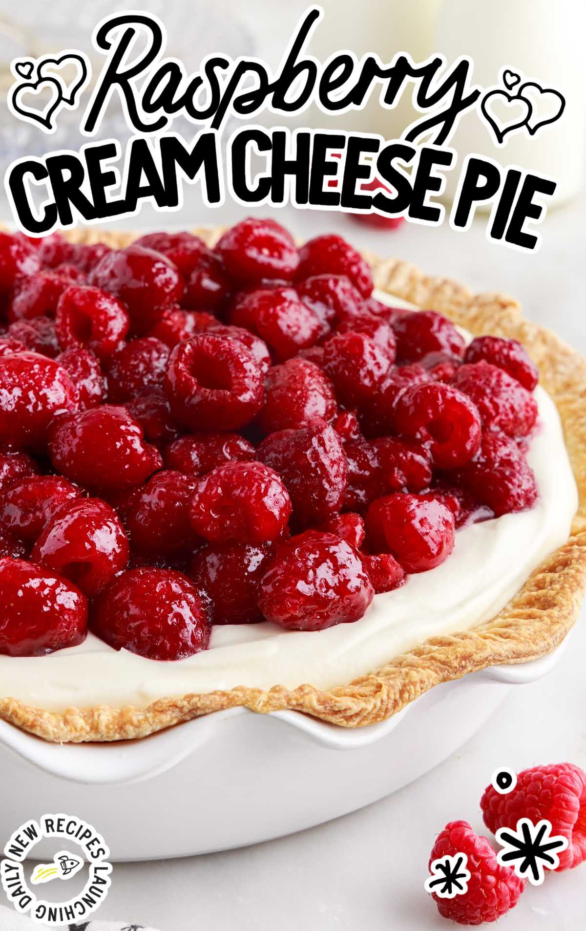 a close up shot of Raspberry Cream Cheese Pie in a pie dish