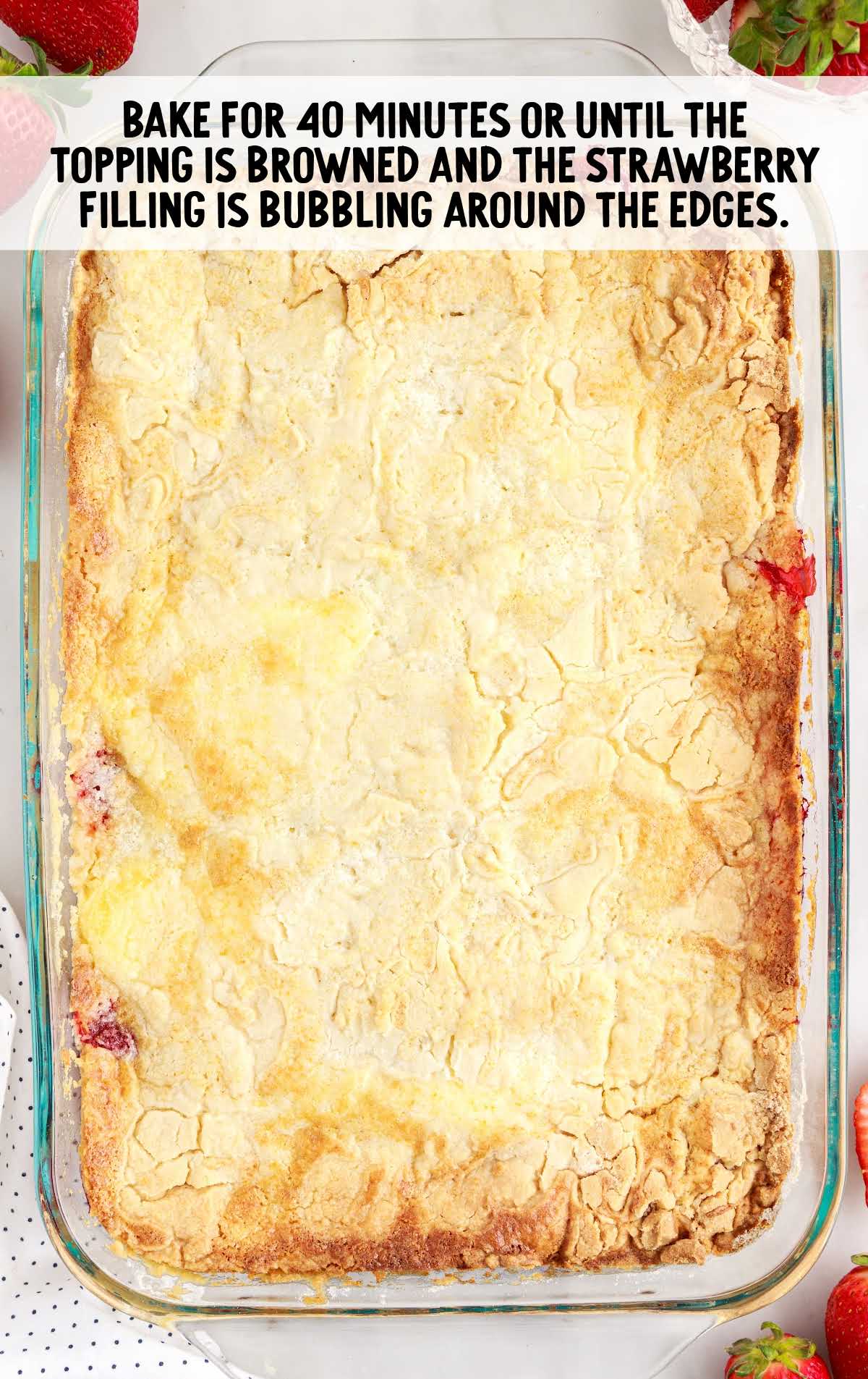 baked Strawberry Cheesecake Dump Cake in a baking dish