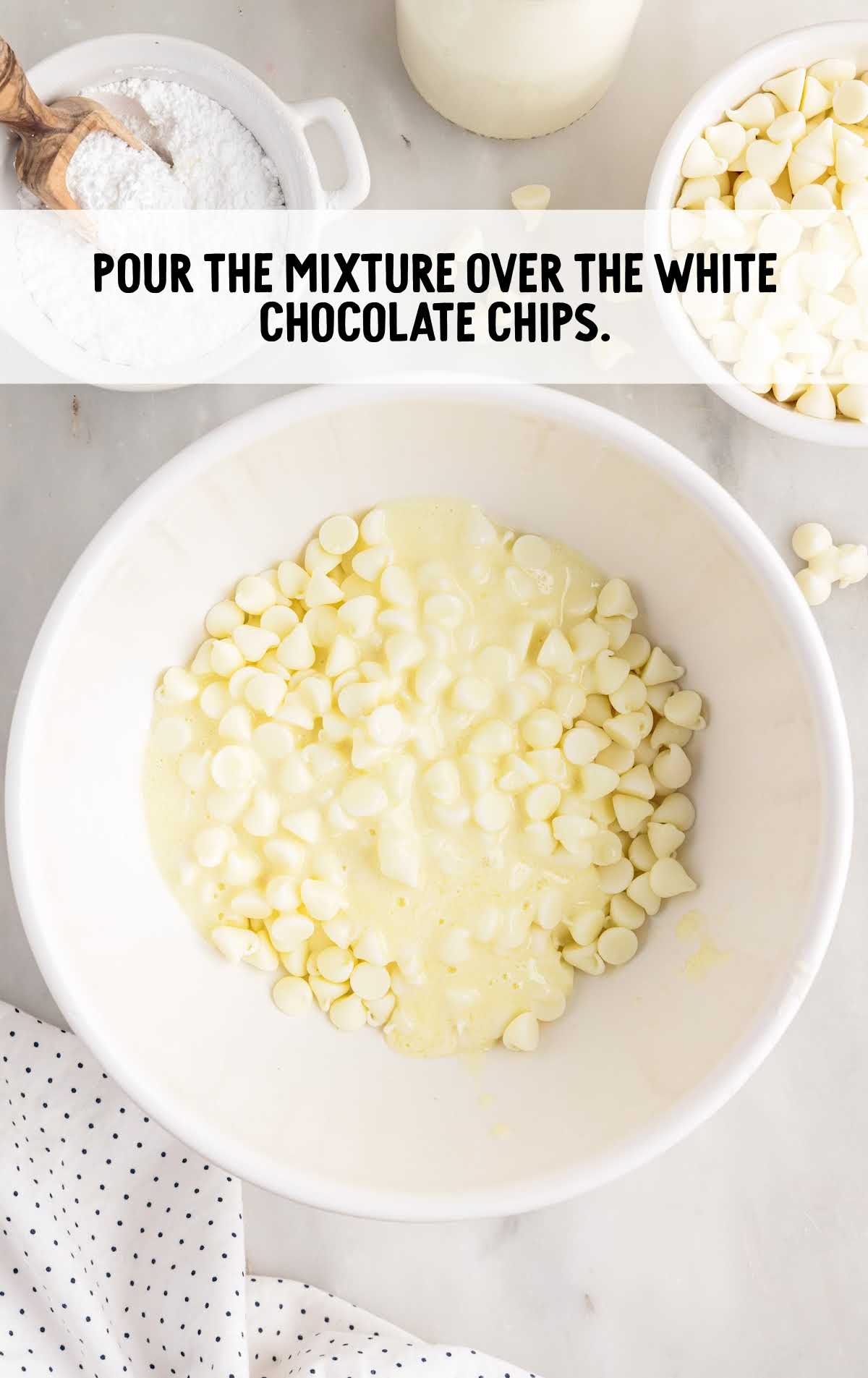 butter mixture poured over the white chocolate chip in a bowl