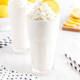 tall glass topped with Whipped Lemonade