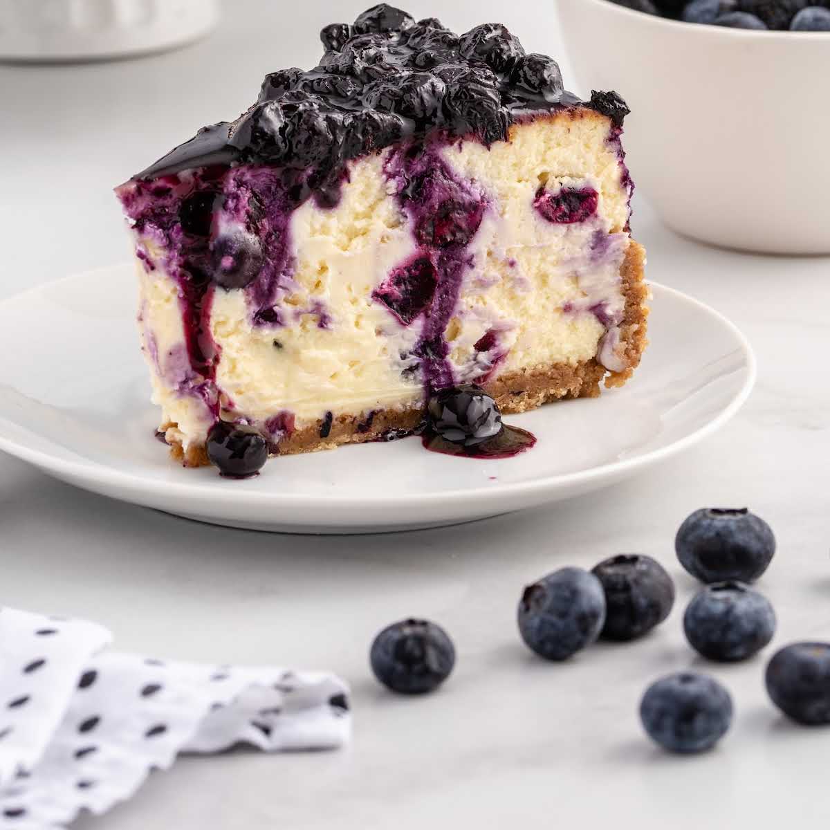 close up shot of a slice of Raspberry Pie on a plate