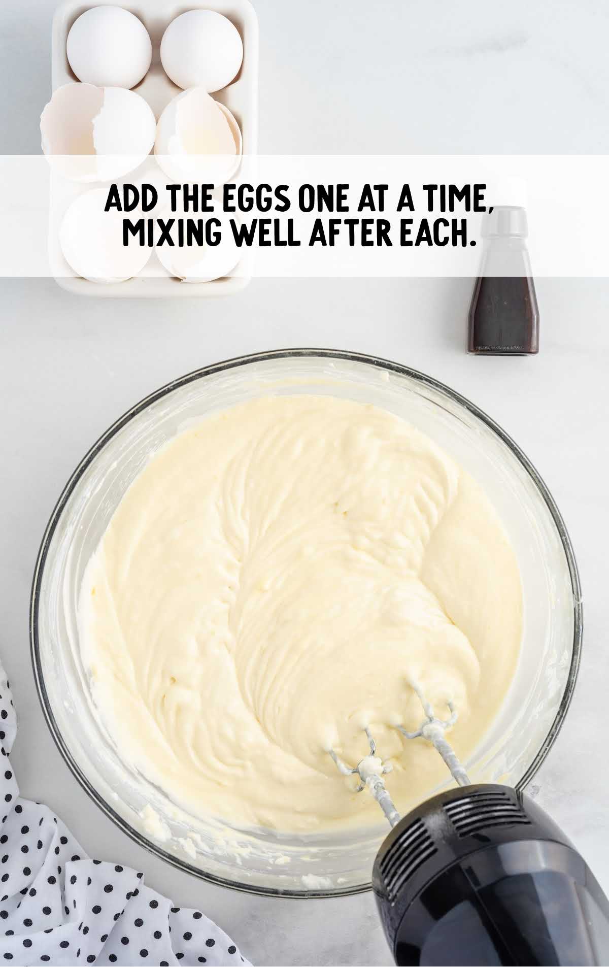 eggs added to the cream cheese mixture and blended in a bowl