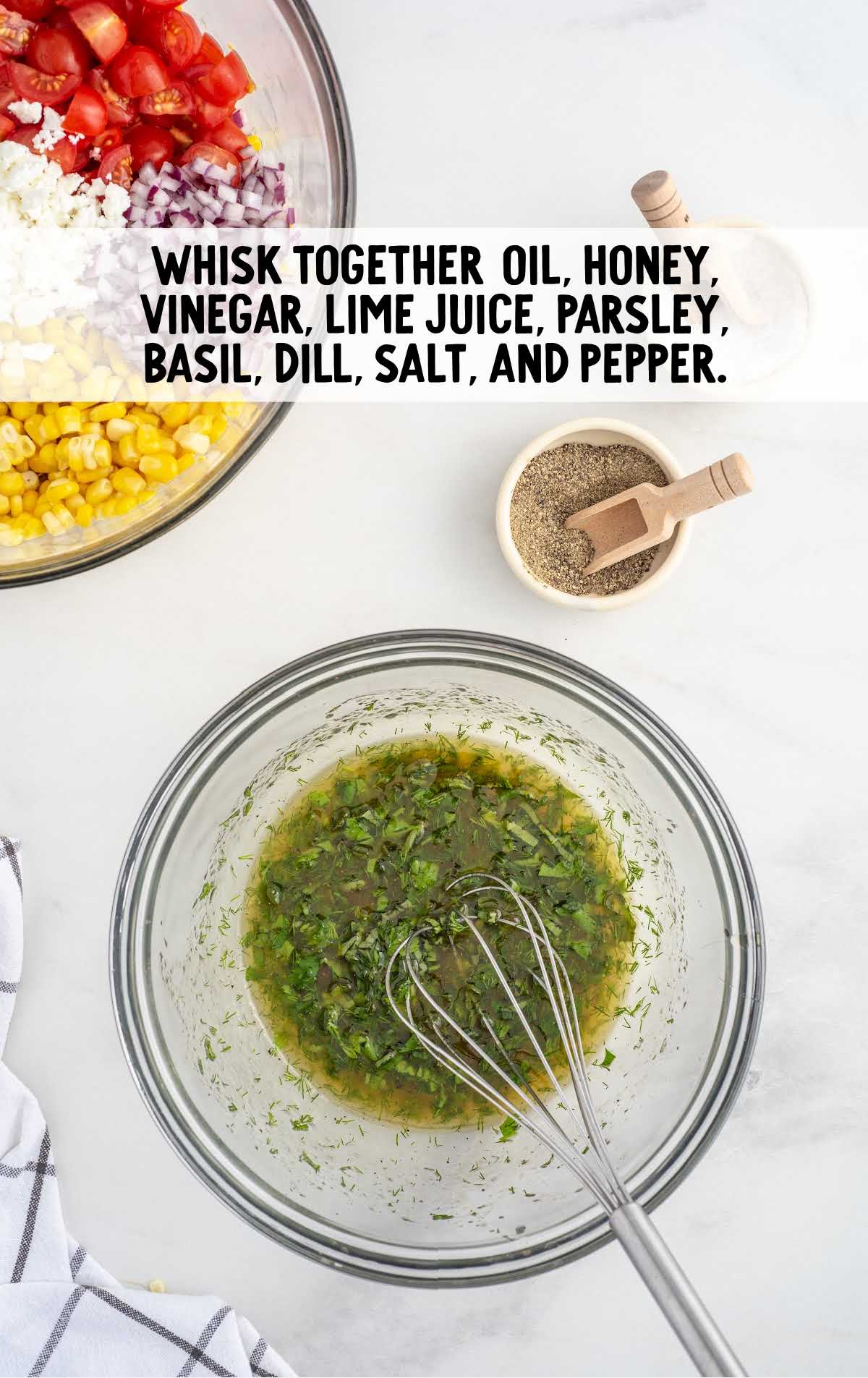 oil, honey, vinegar, lime, parsley, basil, dill, salt, and pepper whisked together in a bowl