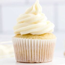 a close up of Cream Cheese Frosting on a cupcake
