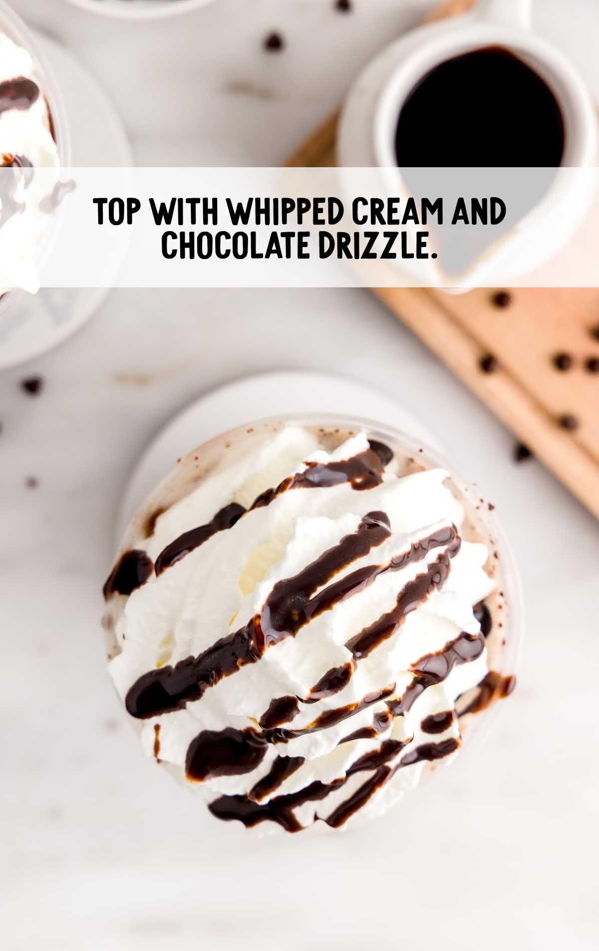Double Chocolate Chip Frappuccino topped with whipped cream and chocolate drizzle