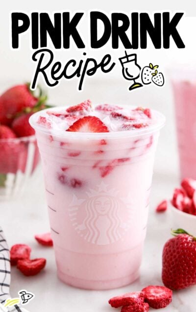 a cup of Pink Drink topped with slices of strawberries