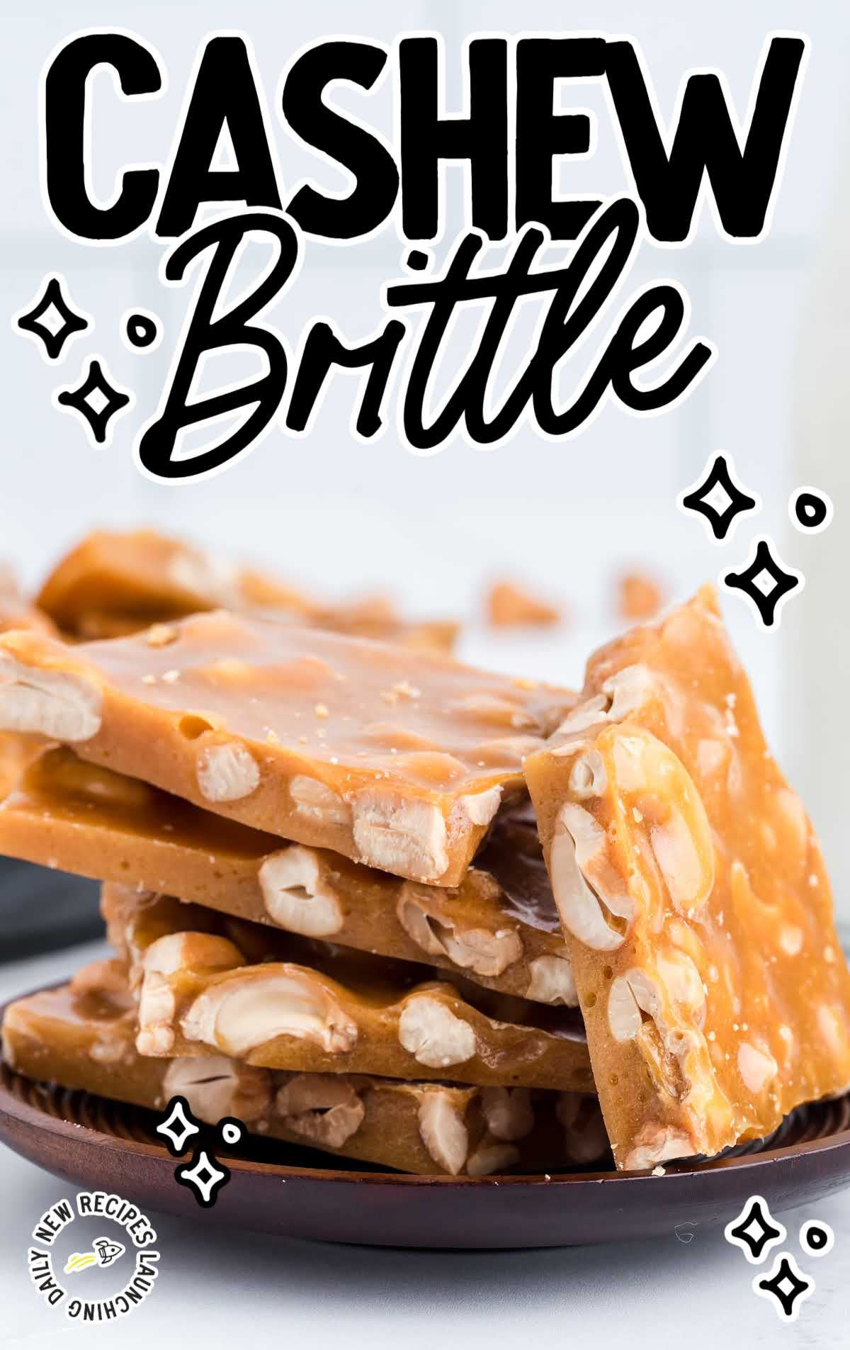 close up shot of Cashew Brittle staked on top of each other on a plate