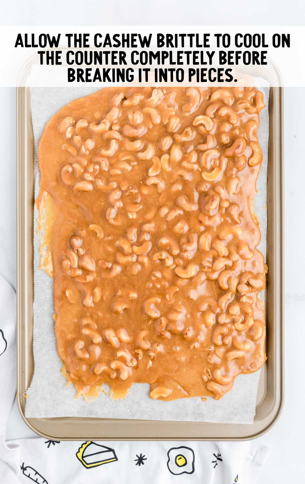 Cashew Brittle cooled on a baking tray
