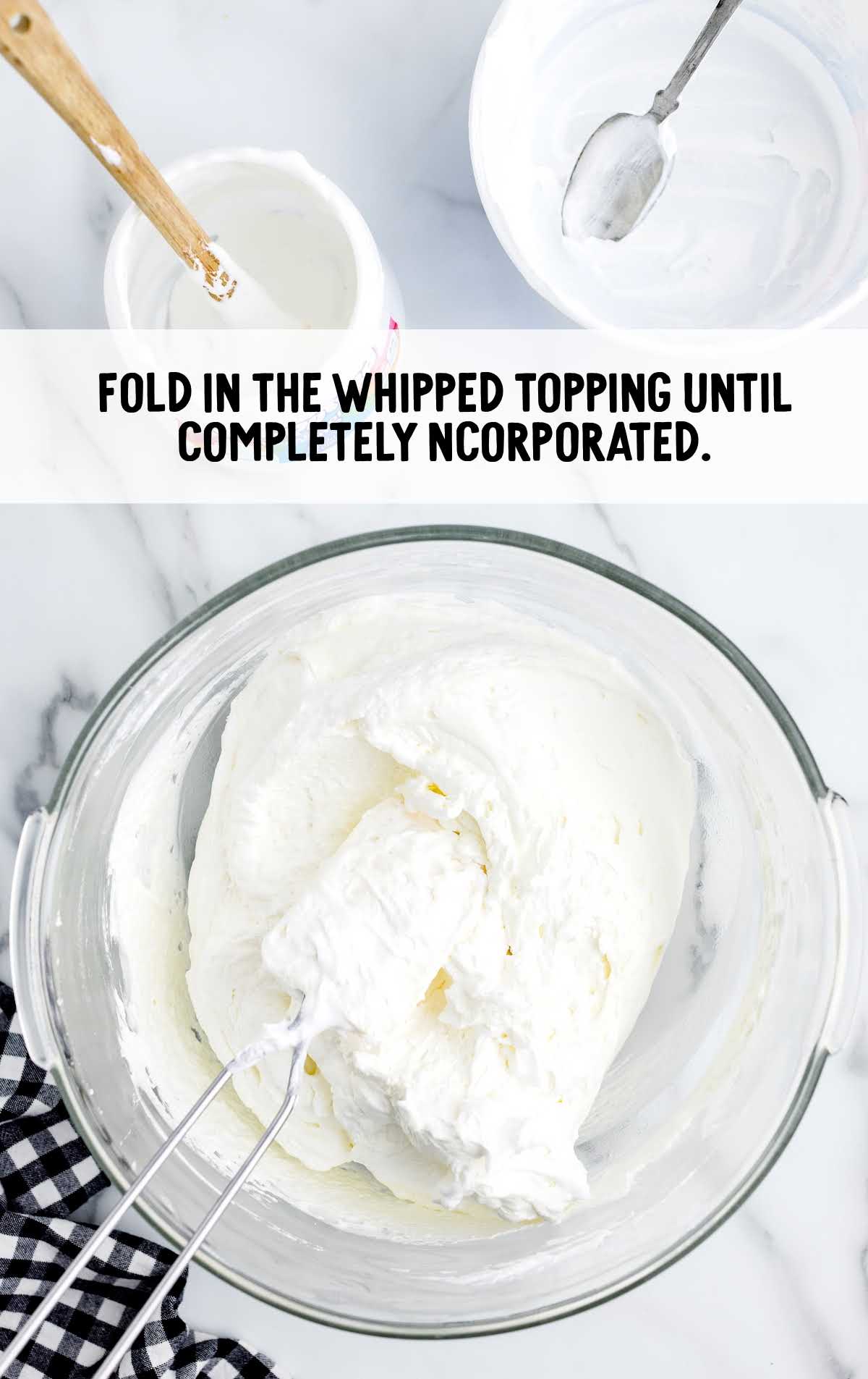 whipped topping folded in a bowl