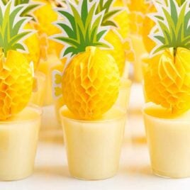 a close up shot of Dole Whip Jello Shots in cups