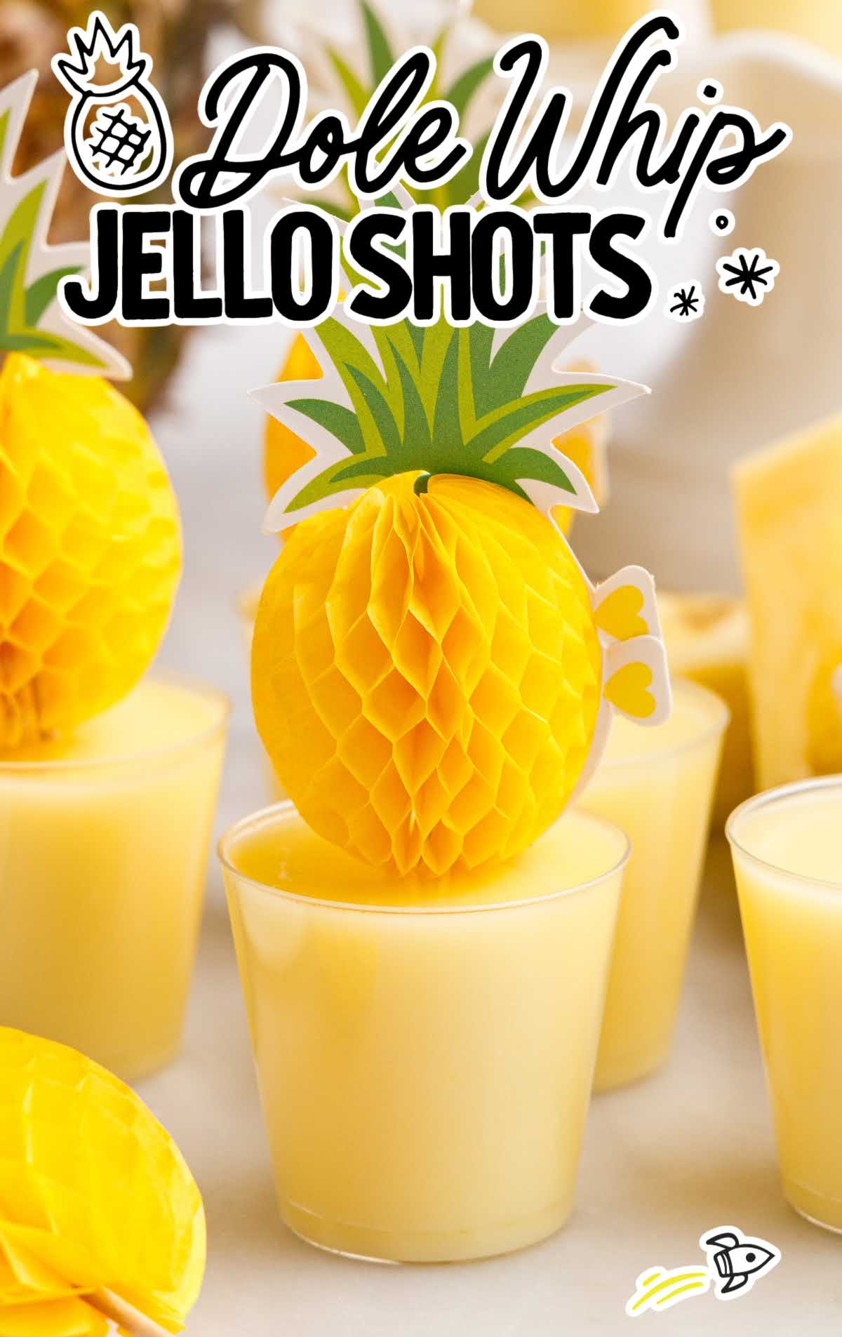 a close up shot of Dole Whip Jello Shots in cups