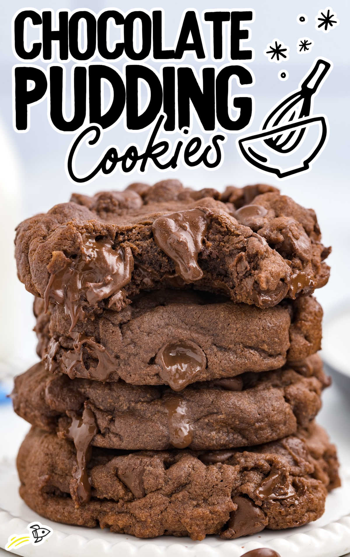 close up shot of Chocolate Pudding Cookies stacked on top of each other on a stand
