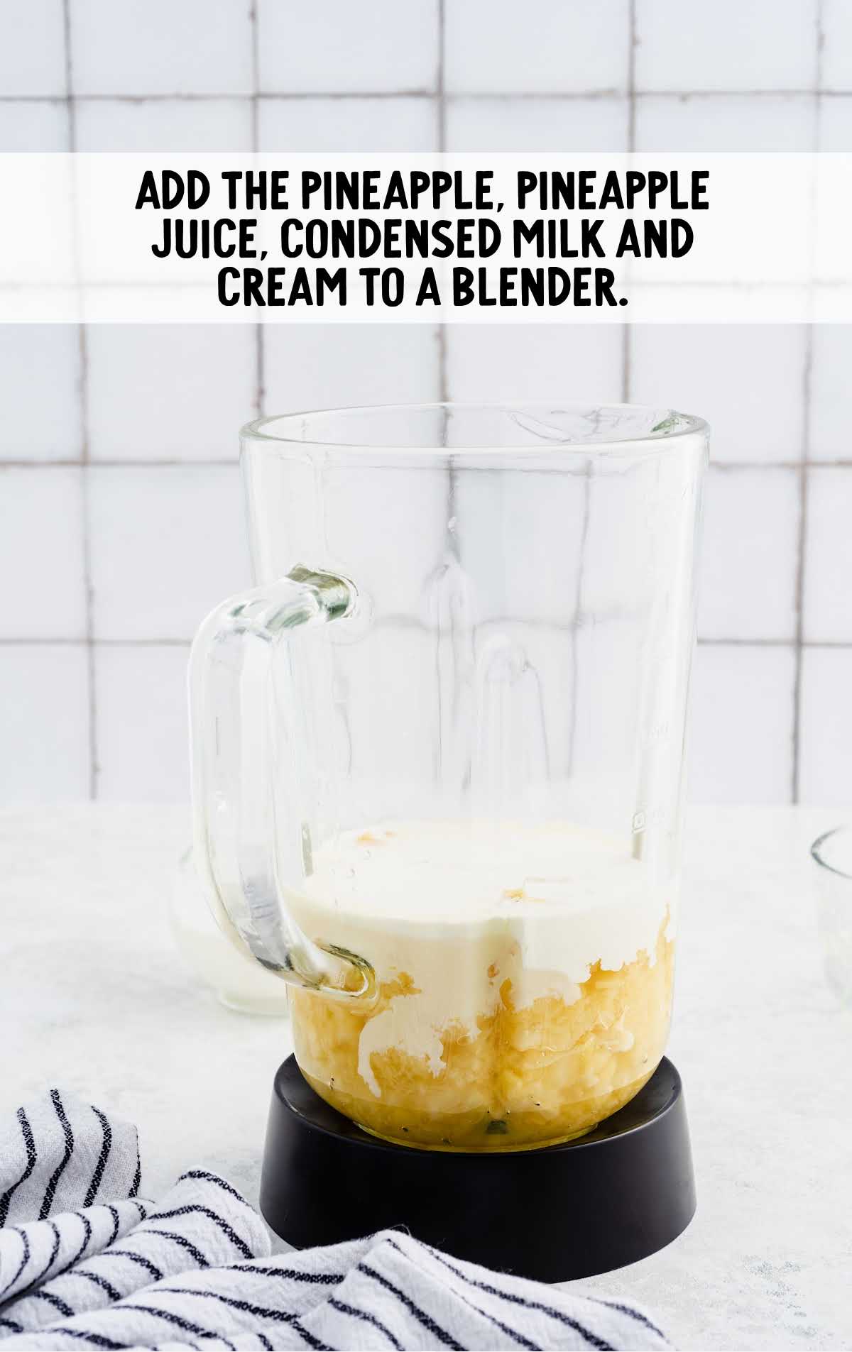pineapple, pineapple juice, condensed milk, and cream added to a blender