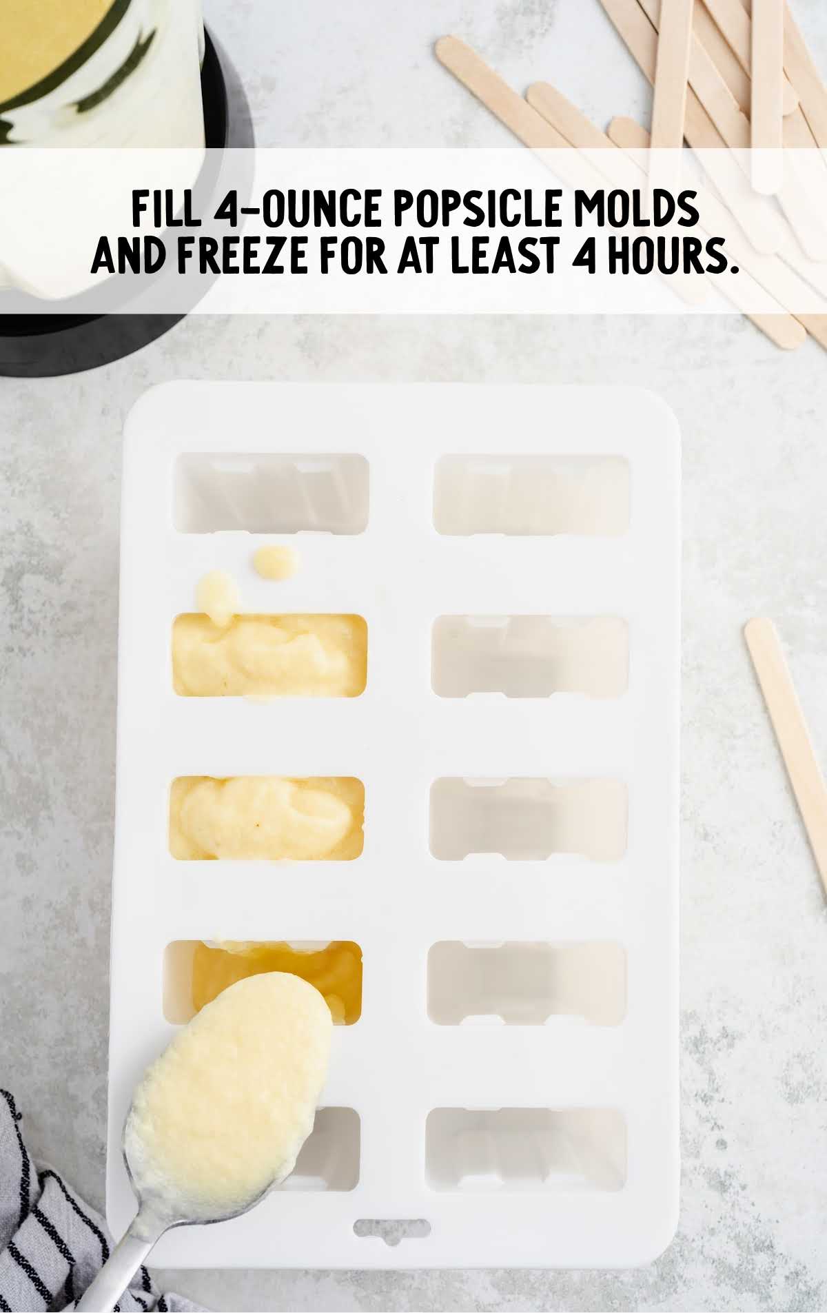fill 4 ounce popsicle mold with a spoon
