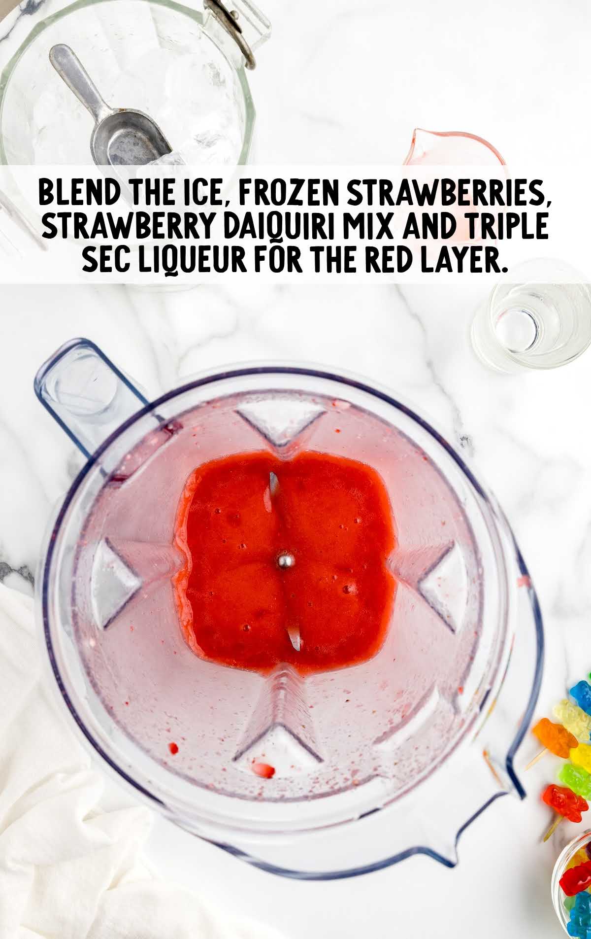 ice, frozen strawberries, strawberry daiquiri mix and triple sec liqueur blended in a blender