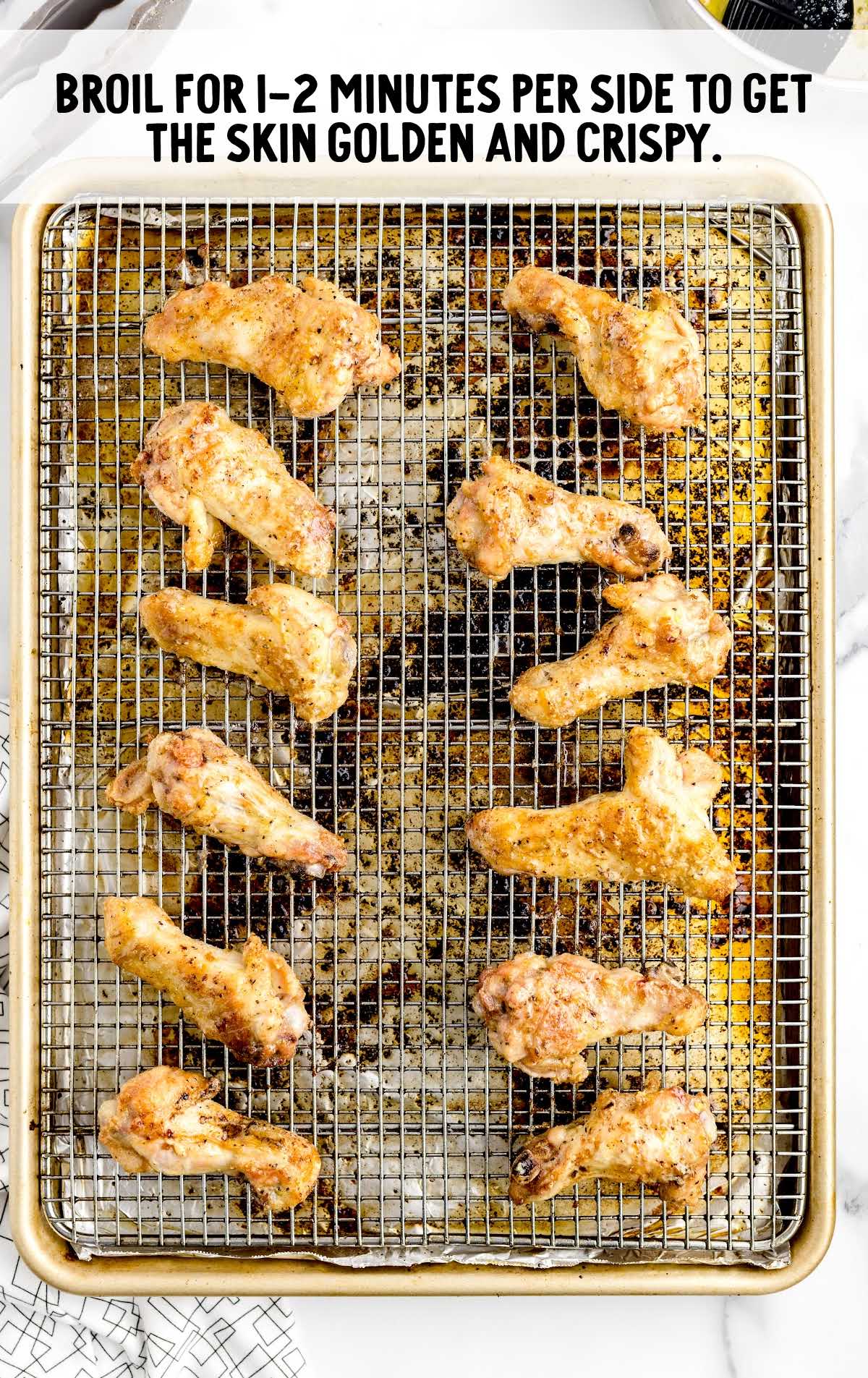 Lemon Pepper Wings broil on a cooling rack
