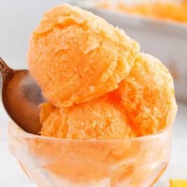 close up shot of Orange Sherbet on a glass cup