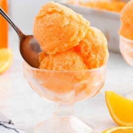 close up shot of Orange Sherbet on a glass cup
