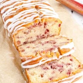 a close up shot of Strawberry Rhubarb Bread sliced